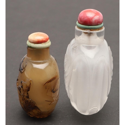 637 - CHINESE AGATE & ROCK CRYSTAL CARVED SNUFF BOTTLES. Including a rock crystal snuff bottle, carved wit... 