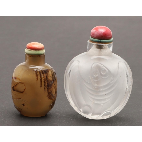 637 - CHINESE AGATE & ROCK CRYSTAL CARVED SNUFF BOTTLES. Including a rock crystal snuff bottle, carved wit... 