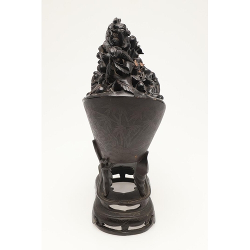 646 - CHINESE BRONZE CENSER & CARVED WOODEN LID. 18th of 19thc, a bronze censer with a foliate design and ... 