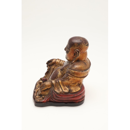 652 - CHINESE GILT BRONZE MODEL OF SEATED BUDAI - MING DYNASTY. A 17thc bronze and gilded figure of a seat... 