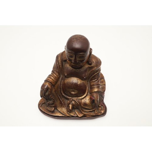 652 - CHINESE GILT BRONZE MODEL OF SEATED BUDAI - MING DYNASTY. A 17thc bronze and gilded figure of a seat... 