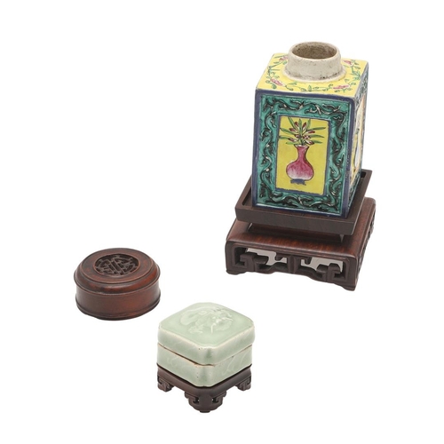 653 - A CHINESE CELADON INK POT ON HARDWOOD STAND, AND A TEA CADDY. Including a Chinese celadon seal paste... 