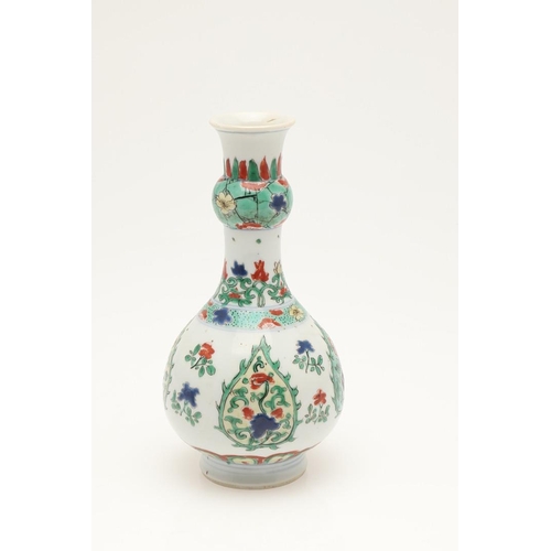 658 - CHINESE FAMILLE VERTE BOTTLE VASE. In the Kangxi style but probably later, the bottle vase with a ga... 