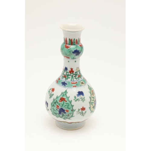 658 - CHINESE FAMILLE VERTE BOTTLE VASE. In the Kangxi style but probably later, the bottle vase with a ga... 