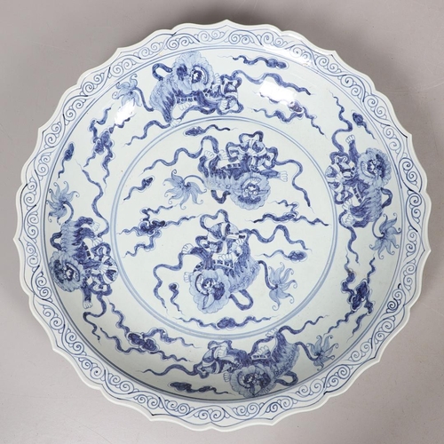 661 - LARGE CHINESE BLUE & WHITE DISH. A large 20thc copy of a Ming Dynasty dish, of unusually large size ... 