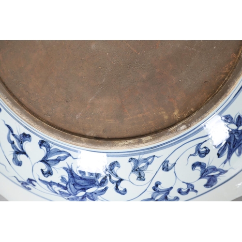 661 - LARGE CHINESE BLUE & WHITE DISH. A large 20thc copy of a Ming Dynasty dish, of unusually large size ... 