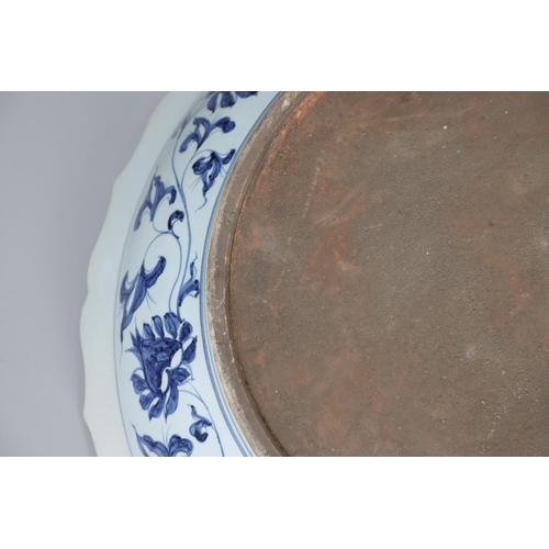 661 - LARGE CHINESE BLUE & WHITE DISH. A large 20thc copy of a Ming Dynasty dish, of unusually large size ... 