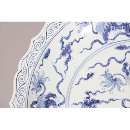 661 - LARGE CHINESE BLUE & WHITE DISH. A large 20thc copy of a Ming Dynasty dish, of unusually large size ... 