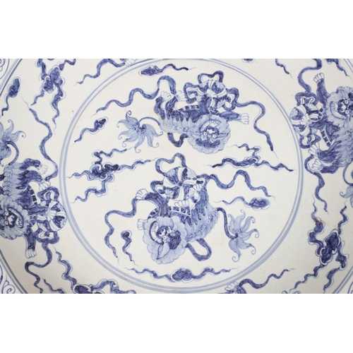 661 - LARGE CHINESE BLUE & WHITE DISH. A large 20thc copy of a Ming Dynasty dish, of unusually large size ... 