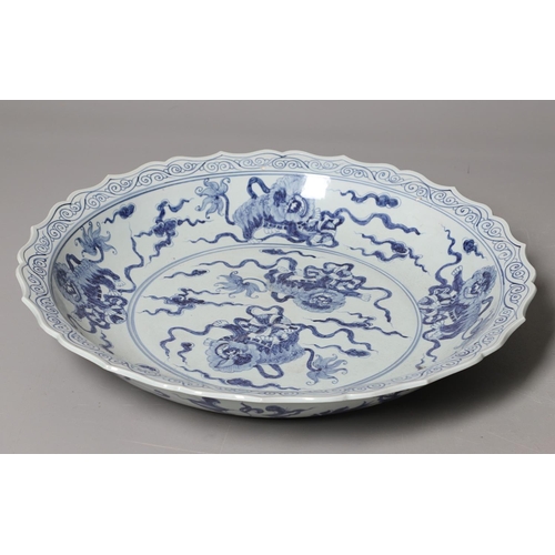 661 - LARGE CHINESE BLUE & WHITE DISH. A large 20thc copy of a Ming Dynasty dish, of unusually large size ... 