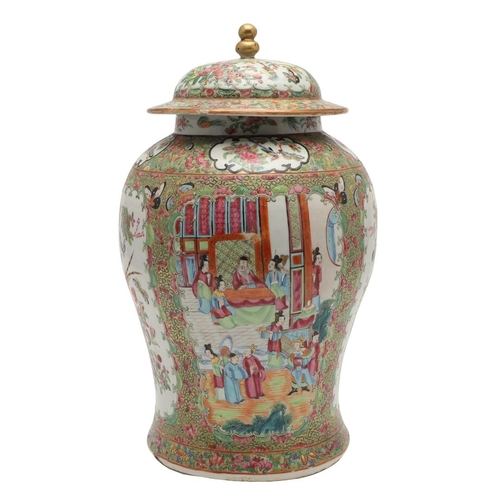 663 - 19THC CHINESE CANTONESE LIDDED JAR. A large 19thc lidded jar, with shaped panels painted with a cour... 