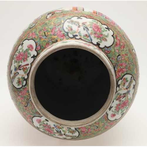 663 - 19THC CHINESE CANTONESE LIDDED JAR. A large 19thc lidded jar, with shaped panels painted with a cour... 