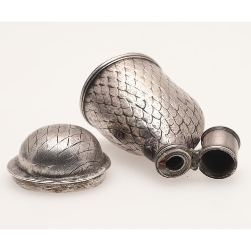 110 - A RARE 18TH CENTURY SILVER SHOT FLASK. with a shaped body, decorated with a textured plumage and a r... 