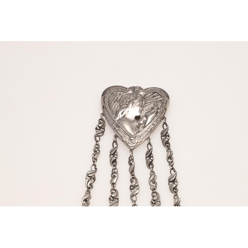 136 - A SILVER CHATELAINE. of Art Nouveau design, the heart shape suspensory panel with female portrait (b... 