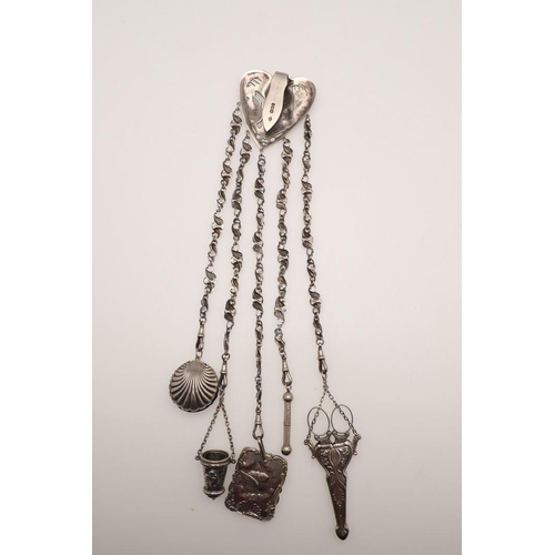 136 - A SILVER CHATELAINE. of Art Nouveau design, the heart shape suspensory panel with female portrait (b... 