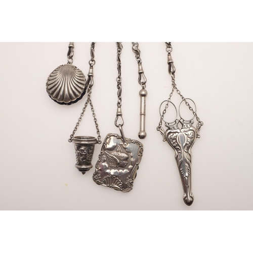 136 - A SILVER CHATELAINE. of Art Nouveau design, the heart shape suspensory panel with female portrait (b... 