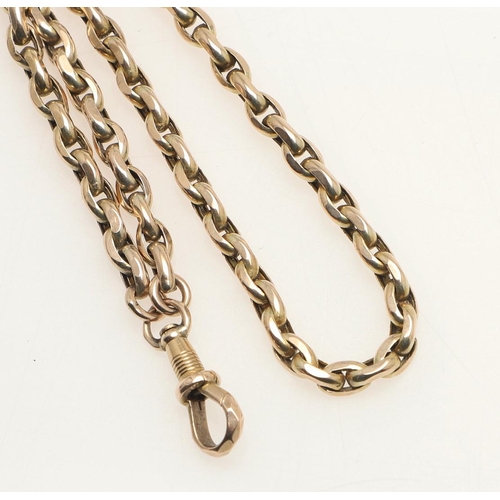 151 - A GOLD LONG GUARD CHAIN. formed with hammered oval-shaped links, with dog clip clasp, not marked, te... 