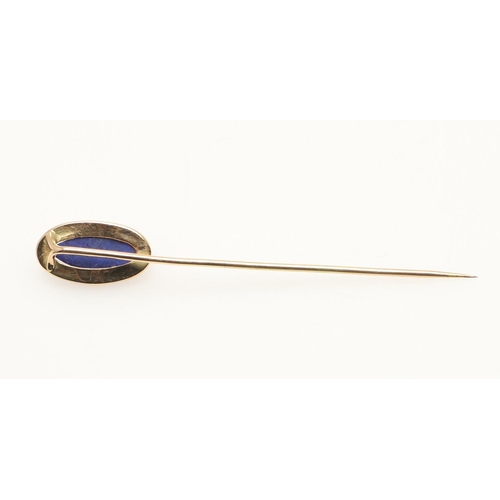 161 - A LAPIS LAZULI AND GOLD STICK PIN BY LOUIS COMFORT TIFFANY FOR TIFFANY & CO. the marquise-shaped lap... 