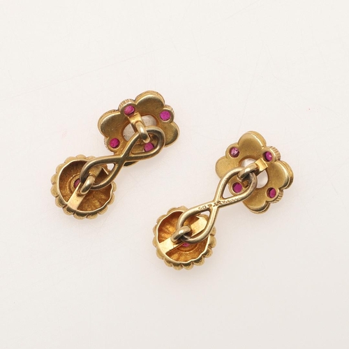 162 - A PAIR OF RUBY, MOONSTONE AND GOLD CUFFLINKS BY LOUIS COMFORT TIFFANY FOR TIFFANY & CO. mounted with... 