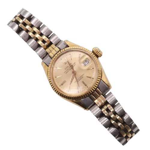 180 - A LADY'S 18CT GOLD OYSTER PERPETUAL LADY-DATEJUST WRISTWATCH BY ROLEX. signed circular gold coloured... 