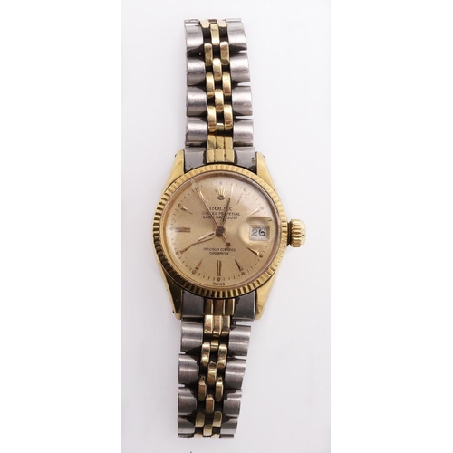 180 - A LADY'S 18CT GOLD OYSTER PERPETUAL LADY-DATEJUST WRISTWATCH BY ROLEX. signed circular gold coloured... 