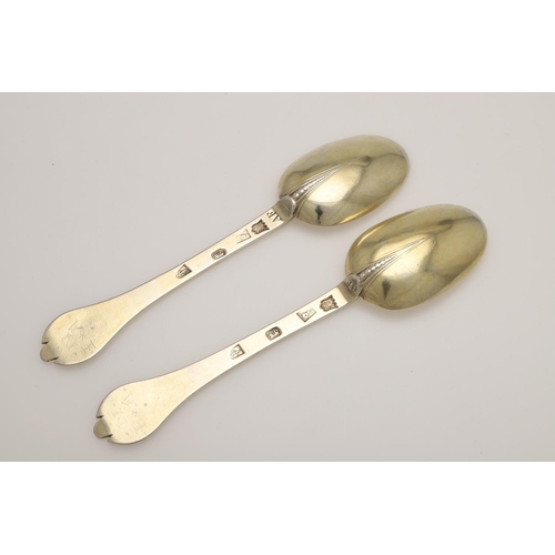 19 - A PAIR OF WILLIAM III SILVERGILT TREFID SPOONS. with beaded rattails and prick-engraved initials 