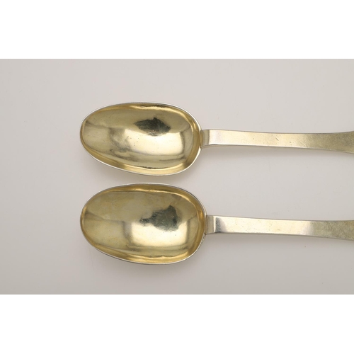 19 - A PAIR OF WILLIAM III SILVERGILT TREFID SPOONS. with beaded rattails and prick-engraved initials 