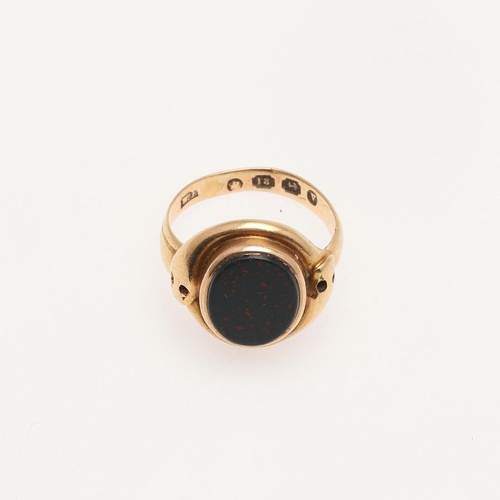 195 - A BLOODSTONE AND 18CT GOLD SNAKE RING. mounted with an oval-shaped bloodstone, hallmarked for Birmin... 