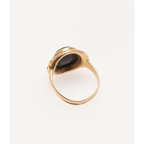 195 - A BLOODSTONE AND 18CT GOLD SNAKE RING. mounted with an oval-shaped bloodstone, hallmarked for Birmin... 