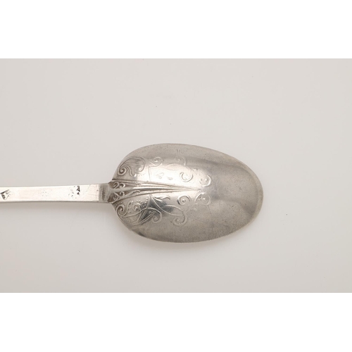 20 - A WILLIAM & MARY SILVER LACE-BACK TREFID SPOON. with a raised rattail and foliate scroll decoration,... 