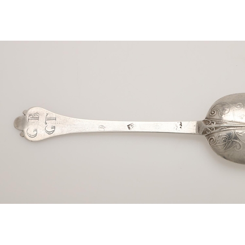 20 - A WILLIAM & MARY SILVER LACE-BACK TREFID SPOON. with a raised rattail and foliate scroll decoration,... 