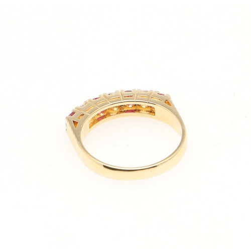 205 - A RUBY AND DIAMOND HALF HOOP RING. mounted with circular-cut rubies and diamonds, in 14ct gold, 4.5 ... 