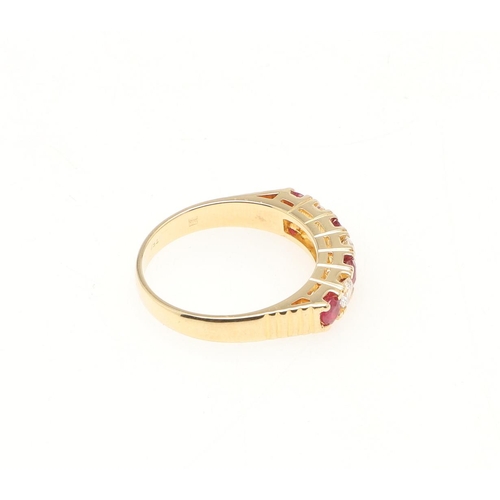 205 - A RUBY AND DIAMOND HALF HOOP RING. mounted with circular-cut rubies and diamonds, in 14ct gold, 4.5 ... 