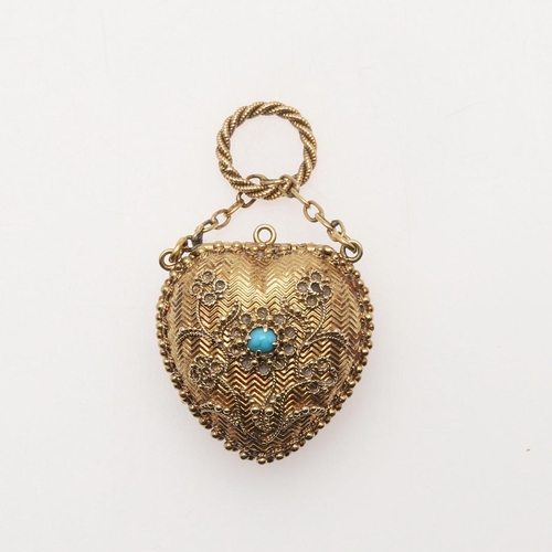 209 - A REGENCY REGARD HEART SHAPED LOCKET PENDANT. with fruiting vine decoration to the front, with gem s... 