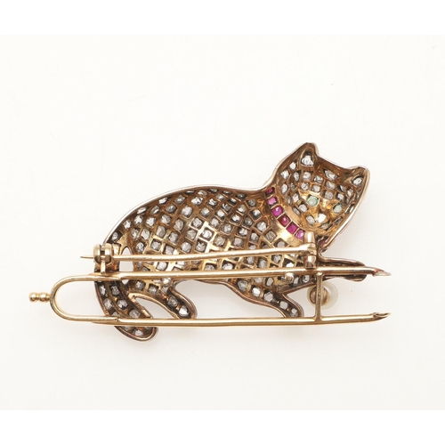 210 - AN EARLY 20TH CENTURY DIAMOND, RUBY AND PEARL CAT BROOCH. mounted overall with rose-cut diamonds, wi... 