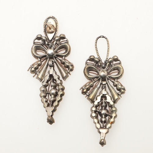 227 - A PAIR OF GEORGIAN PASTE DROP EARRINGS. of ribbon and bow design, each set with foil backed yellow p... 