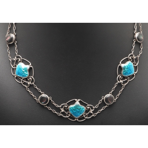 228 - AN ARTS & CRAFTS NEWLYN ENAMEL AND SILVER NECKLACE. formed with sections of turquoise enamel in intr... 