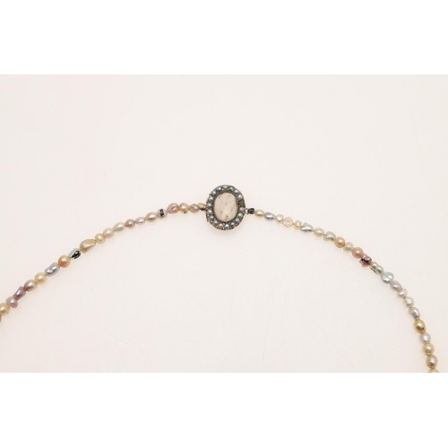 235 - A SINGLE ROW GRADUATED BAROQUE MULTI-COLOURED NATURAL PEARL NECKLACE. the pearls graduate to a Georg... 