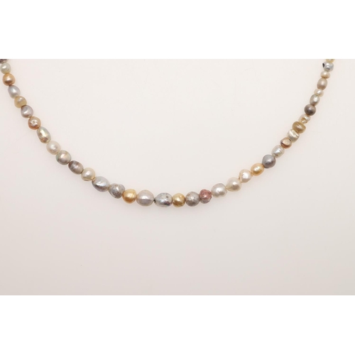 235 - A SINGLE ROW GRADUATED BAROQUE MULTI-COLOURED NATURAL PEARL NECKLACE. the pearls graduate to a Georg... 