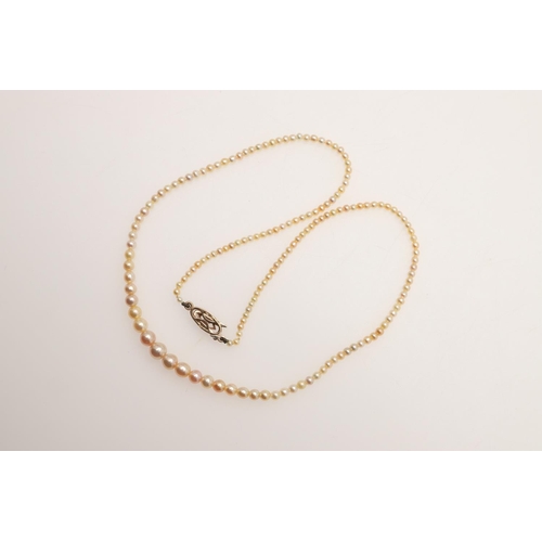 240 - A SINGLE ROW GRADUATED NATURAL PEARL NECKLACE. the one hundred and fifty eight pearls graduate from ... 