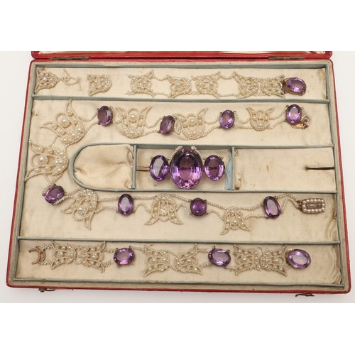 245 - A VICTORIAN AMETHYST AND SEED PEARL SUITE OF JEWELLERY. comprising an amethyst brooch formed with th... 