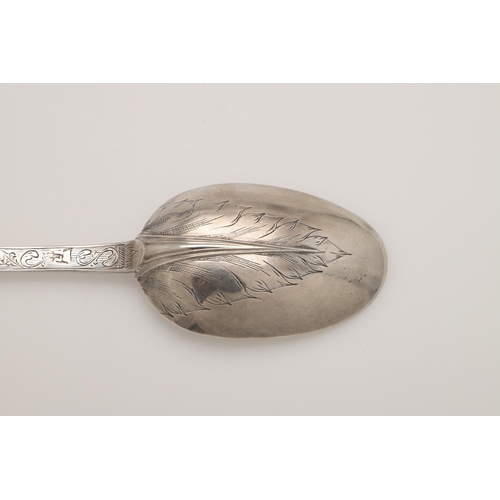 25 - A JAMES II SILVER TREFID SPOON. with a ribbed rattail and engraved with arabesques & acanthus decora... 