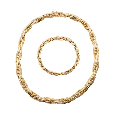 253 - AN 18CT GOLD NECKLACE. formed with plain and textured scrolling links to a concealed clasp, 45cm lon... 