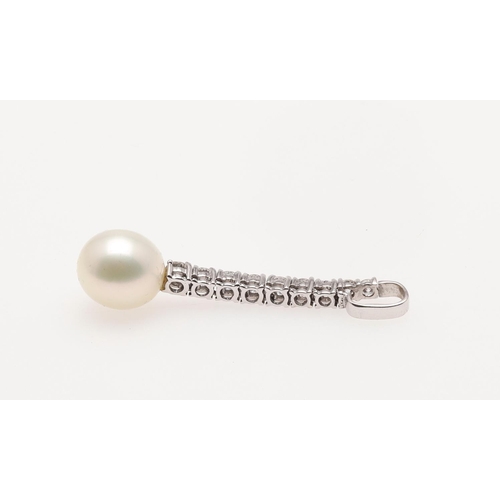 254 - A DIAMOND AND CULTURED PEARL PENDANT. mounted with a cultured pearl drop measuring approximately 11.... 