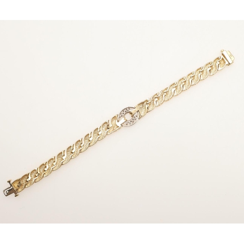 257 - A DIAMOND AND 14CT GOLD BRACELET. the oval-shaped centre set with circular-cut diamonds, to a fancy ... 