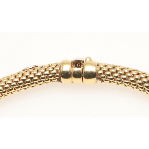 261 - AN 18CT GOLD WOVEN TUBULAR NECKLACE. 42.5cm long, 50 grams.