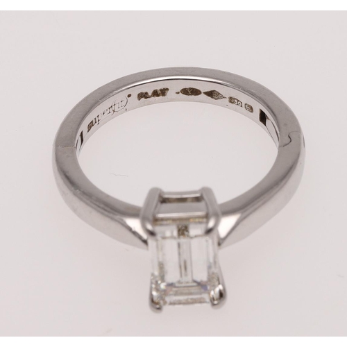 266 - A DIAMOND SOLITAIRE RING. mounted with an emerald-cut diamond weighing 1.55 carats in platinum, 6.9 ... 