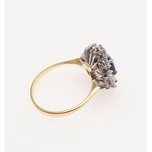 272 - A SAPPHIRE AND DIAMOND CLUSTER RING. the oval-shaped sapphire is set within a surround of marquise-c... 