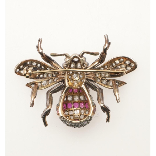 287 - A 19TH CENTURY RUBY AND DIAMOND BEE BROOCH. mounted with circular-cut rubies and set overall with gr... 