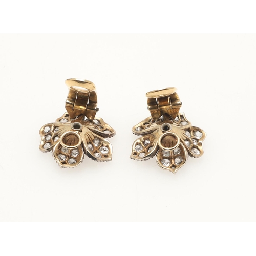 289 - A PAIR OF VICTORIAN DIAMOND EARRINGS. of flowerhead form, each centred with a circular old-cut diamo... 